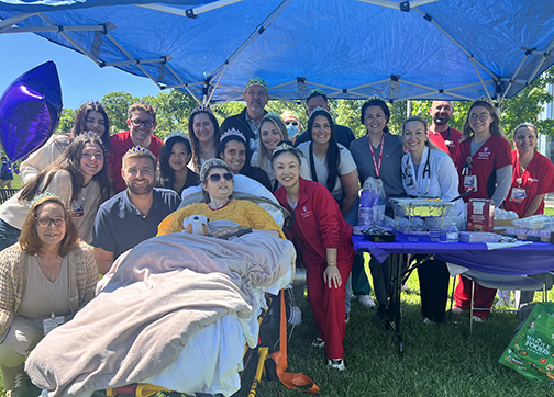 Group under tent at Picnic