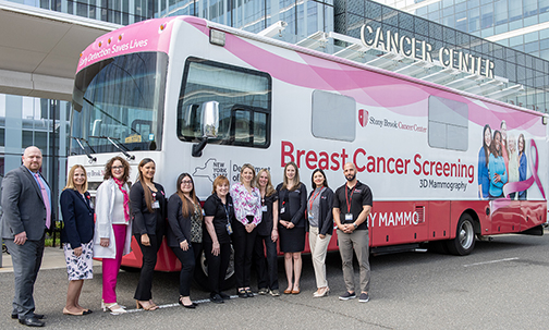 Photo of Group in front of Mammogram Van