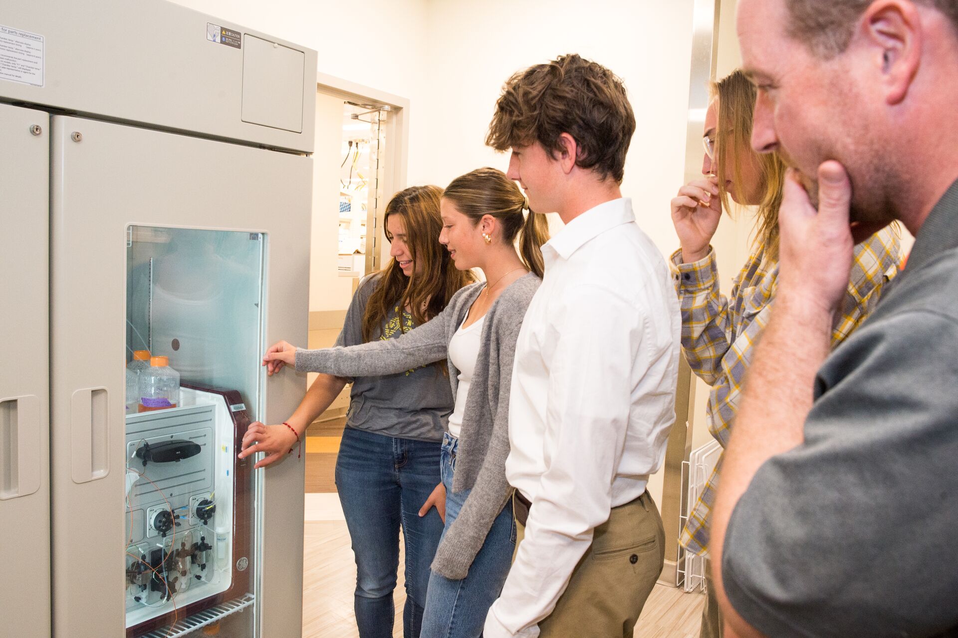 teacher and students in Lab