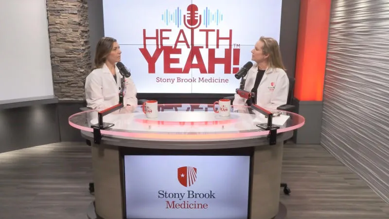 Doctors at the table recording a podcast.