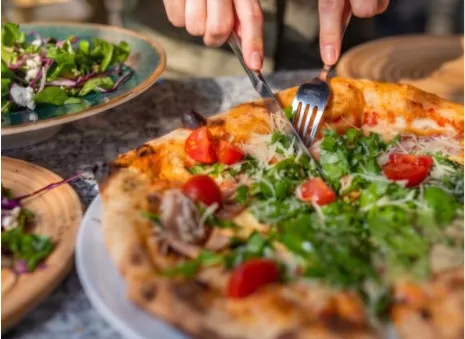 A closeup of brick oven pizza